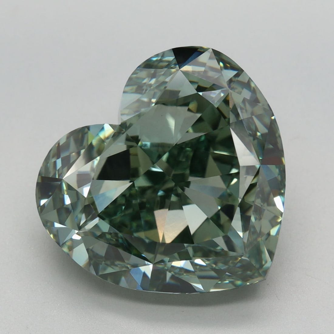 Loose Diamond - HEART 9.32ct Fancy Vivid Green VVS2: Loose Diamond - HEART 9.32ct Fancy Vivid Green VVS2 Source: This is a real non-mined Diamond that has been grown in a lab Shape: HEART Carats: 9.32 Color: Fancy Vivid Green Certification: IGI Video: