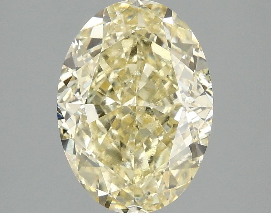 Loose Diamond - OVAL 3.06ct Fancy Vivid Yellow VS1: Loose Diamond - OVAL 3.06ct Fancy Vivid Yellow VS1 Source: This is a real non-mined Diamond that has been grown in a lab Shape: OVAL Carats: 3.06 Color: Fancy Vivid Yellow Certification: IGI Video: