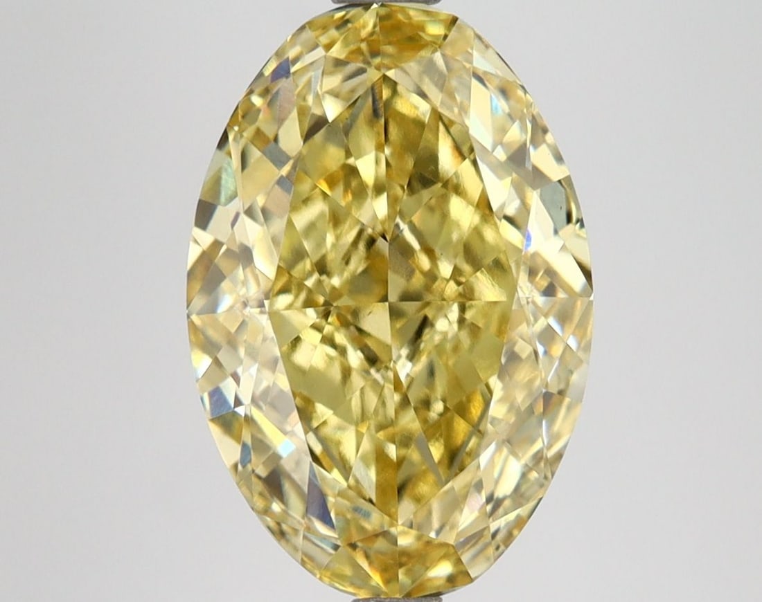 Loose Diamond - OVAL 4.54ct Fancy Intense Yellow VS1: Loose Diamond - OVAL 4.54ct Fancy Intense Yellow VS1 Source: This is a real non-mined Diamond that has been grown in a lab Shape: OVAL Carats: 4.54 Color: Fancy Intense Yellow Certification: IGI Video