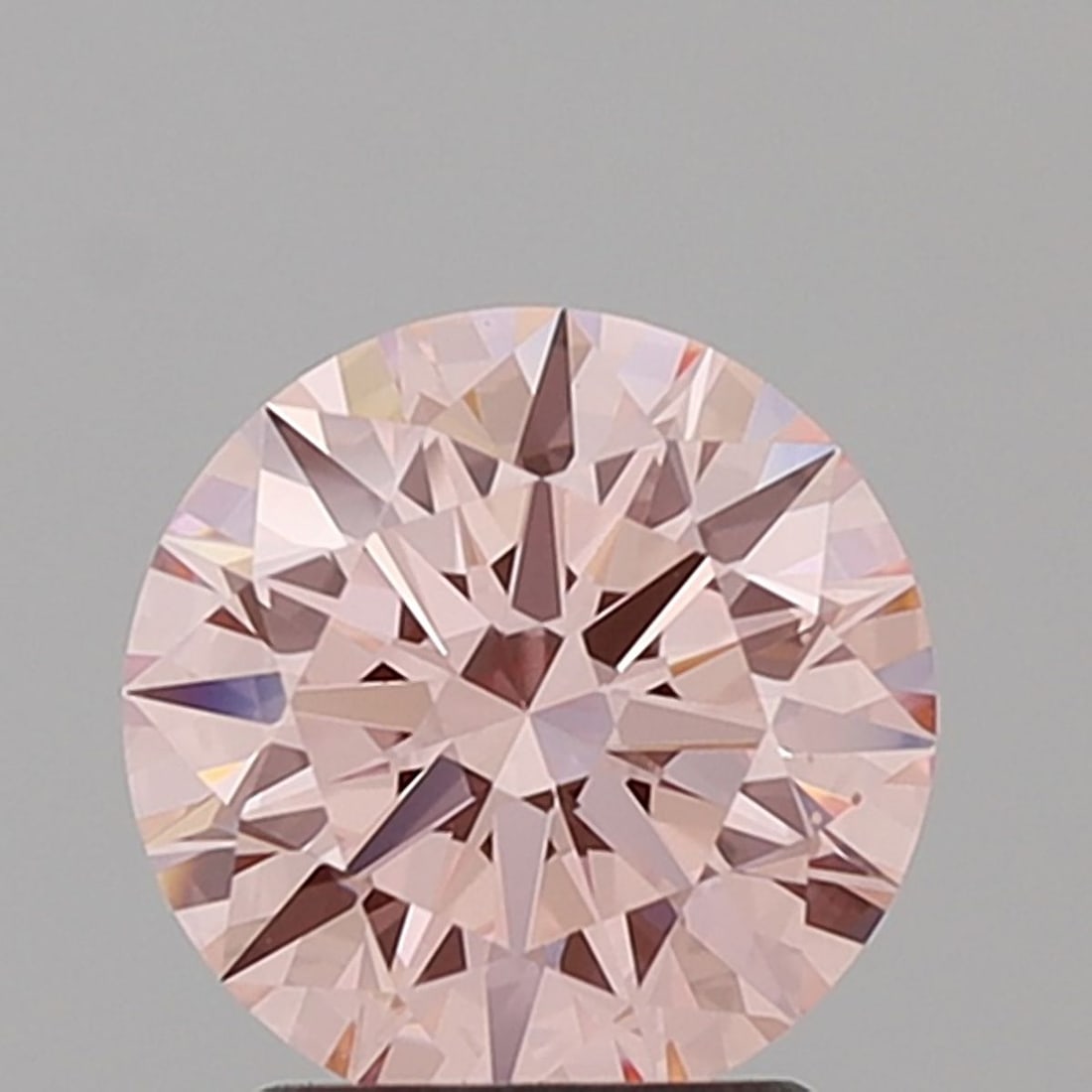 Ideal Loose Diamond - ROUND 2.05ct Fancy Intense Pink VVS2: Ideal Loose Diamond - ROUND 2.05ct Fancy Intense Pink VVS2 Source: This is a real non-mined Diamond that has been grown in a lab Shape: ROUND Carats: 2.05 Color: Fancy Intense Pink Certification: IGI