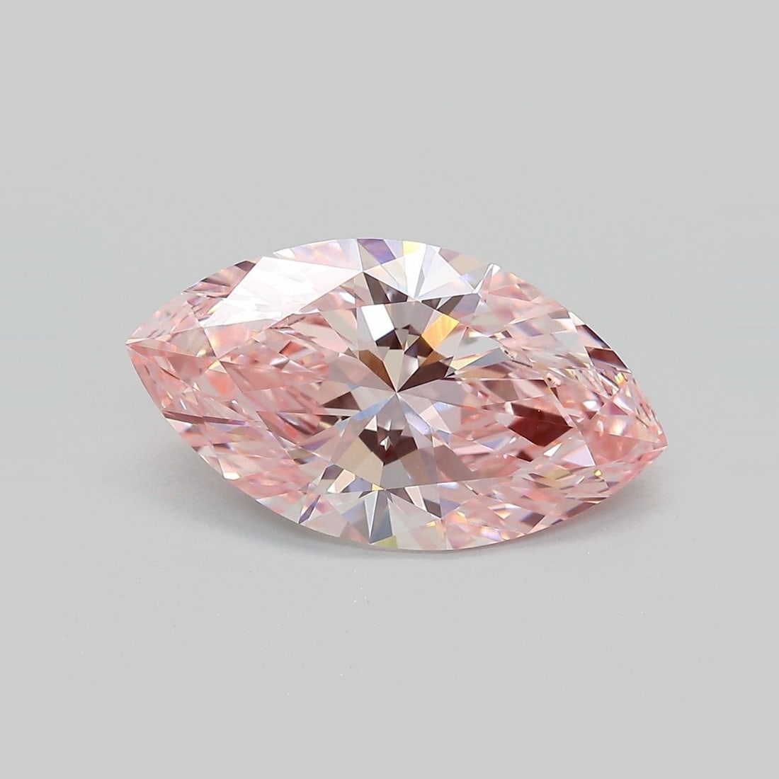 Loose Diamond - MARQUISE 4.03ct Fancy Vivid Pink VVS2: Loose Diamond - MARQUISE 4.03ct Fancy Vivid Pink VVS2 Source: This is a real non-mined Diamond that has been grown in a lab Shape: MARQUISE Carats: 4.03 Color: Fancy Vivid Pink Certification: IGI Vide