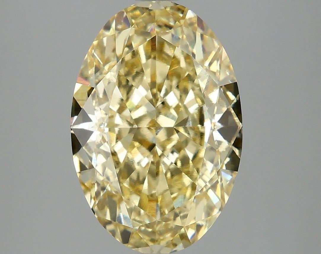 Loose Diamond - OVAL 5.1ct Fancy Intense Yellow VVS2: Loose Diamond - OVAL 5.1ct Fancy Intense Yellow VVS2 Source: This is a real non-mined Diamond that has been grown in a lab Shape: OVAL Carats: 5.1 Color: Fancy Intense Yellow Certification: IGI Video: