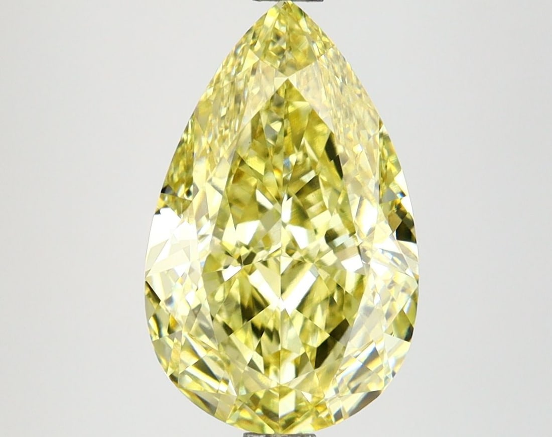 Loose Diamond - PEAR 3.66ct Fancy Intense Yellow VVS2: Loose Diamond - PEAR 3.66ct Fancy Intense Yellow VVS2 Source: This is a real non-mined Diamond that has been grown in a lab Shape: PEAR Carats: 3.66 Color: Fancy Intense Yellow Certification: IGI Vide