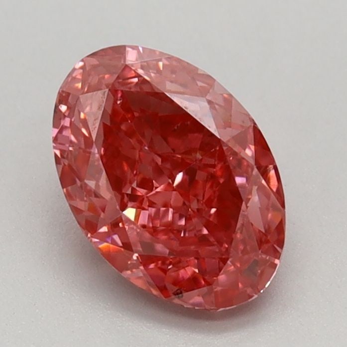 Loose Diamond - OVAL 0.89ct Fancy Vivid Pink VS2: Loose Diamond - OVAL 0.89ct Fancy Vivid Pink VS2 Source: This is a real non-mined Diamond that has been grown in a lab Shape: OVAL Carats: 0.89 Color: Fancy Vivid Pink Certification: IGI Video:
