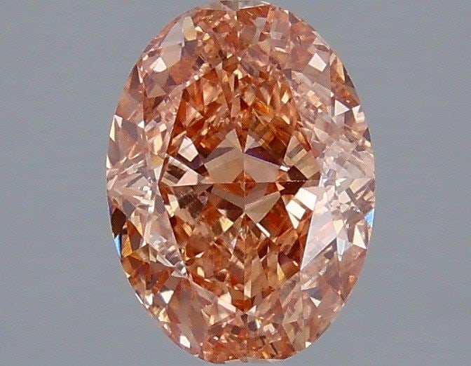 Loose Diamond - OVAL 2.07ct Fancy Vivid Orangey Pink VS1: Loose Diamond - OVAL 2.07ct Fancy Vivid Orangey Pink VS1 Source: This is a real non-mined Diamond that has been grown in a lab Shape: OVAL Carats: 2.07 Color: Fancy Vivid Orangey Pink Certification: I