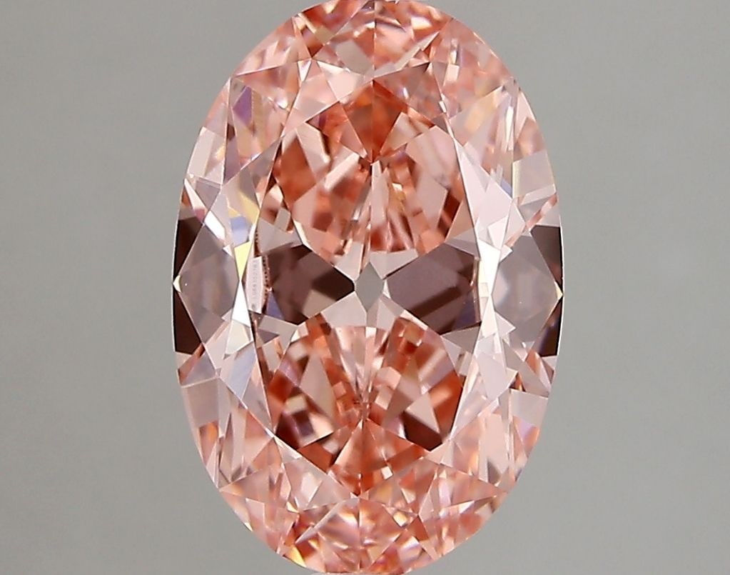 Loose Diamond - OVAL 2.75ct Fancy Vivid Pink VVS2: Loose Diamond - OVAL 2.75ct Fancy Vivid Pink VVS2 Source: This is a real non-mined Diamond that has been grown in a lab Shape: OVAL Carats: 2.75 Color: Fancy Vivid Pink Certification: IGI Video: