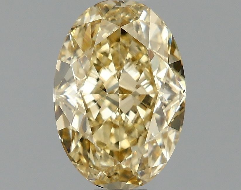 Loose Diamond - OVAL 1.09ct Fancy Intense Yellow VS1: Loose Diamond - OVAL 1.09ct Fancy Intense Yellow VS1 Source: This is a real non-mined Diamond that has been grown in a lab Shape: OVAL Carats: 1.09 Color: Fancy Intense Yellow Certification: IGI Video