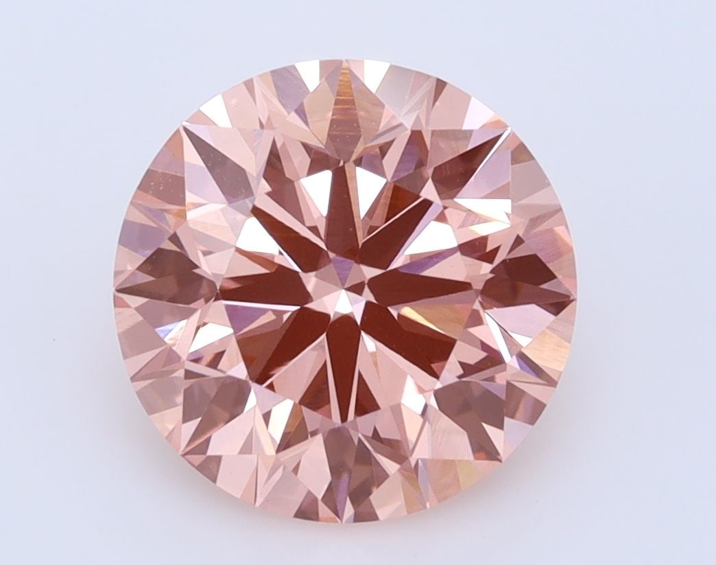 Ideal Loose Diamond - ROUND 3.1ct Fancy Vivid Pink VS1: Ideal Loose Diamond - ROUND 3.1ct Fancy Vivid Pink VS1 Source: This is a real non-mined Diamond that has been grown in a lab Shape: ROUND Carats: 3.1 Color: Fancy Vivid Pink Certification: IGI Video: