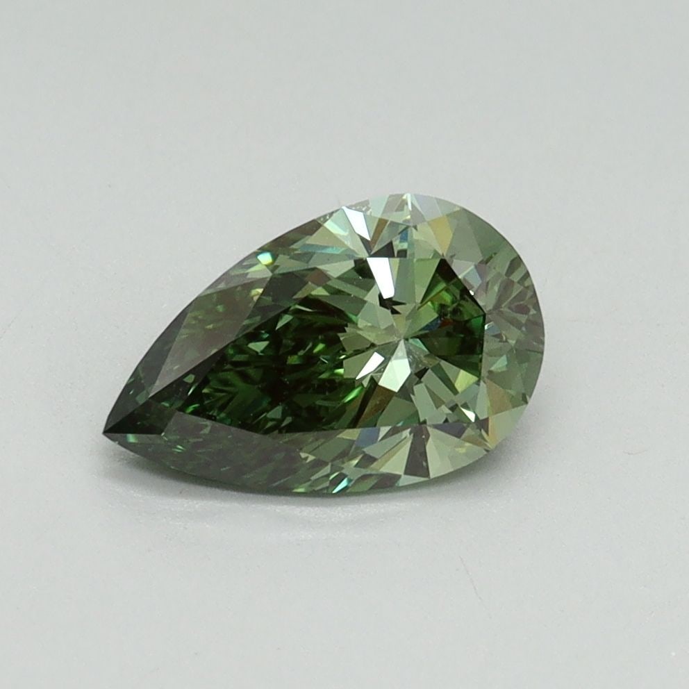 Loose Diamond - PEAR 1.0ct Fancy Vivid Green VVS2: Loose Diamond - PEAR 1.0ct Fancy Vivid Green VVS2 Source: This is a real non-mined Diamond that has been grown in a lab Shape: PEAR Carats: 1.0 Color: Fancy Vivid Green Certification: IGI Video: