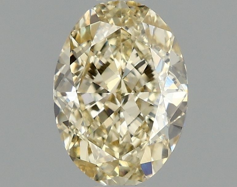 Loose Diamond - OVAL 1.1ct Fancy Yellow VS1: Loose Diamond - OVAL 1.1ct Fancy Yellow VS1 Source: This is a real non-mined Diamond that has been grown in a lab Shape: OVAL Carats: 1.1 Color: Fancy Yellow Certification: IGI Video: