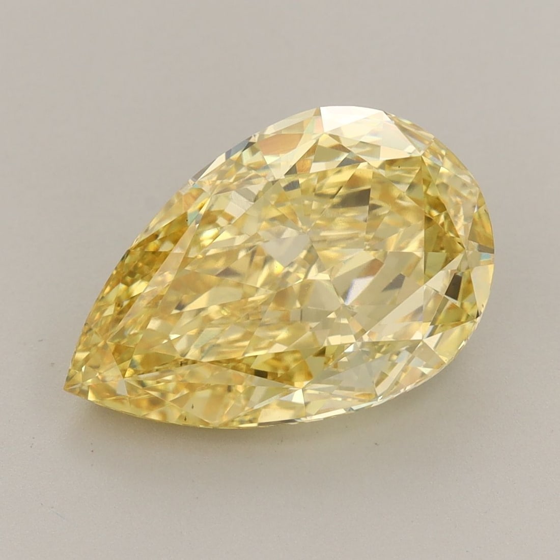 Loose Diamond - PEAR 5.23ct Fancy Vivid Yellow VS1: Loose Diamond - PEAR 5.23ct Fancy Vivid Yellow VS1 Source: This is a real non-mined Diamond that has been grown in a lab Shape: PEAR Carats: 5.23 Color: Fancy Vivid Yellow Certification: IGI Video: