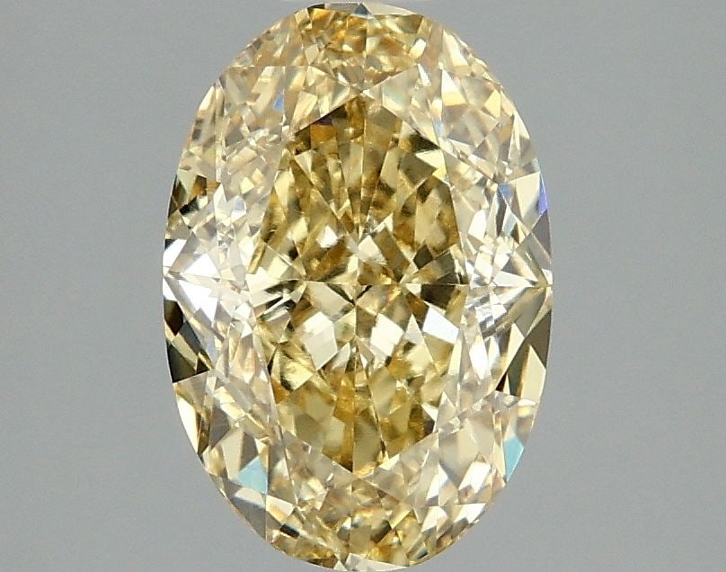Loose Diamond - OVAL 2.1ct Fancy Intense Yellow VVS2: Loose Diamond - OVAL 2.1ct Fancy Intense Yellow VVS2 Source: This is a real non-mined Diamond that has been grown in a lab Shape: OVAL Carats: 2.1 Color: Fancy Intense Yellow Certification: IGI Video: