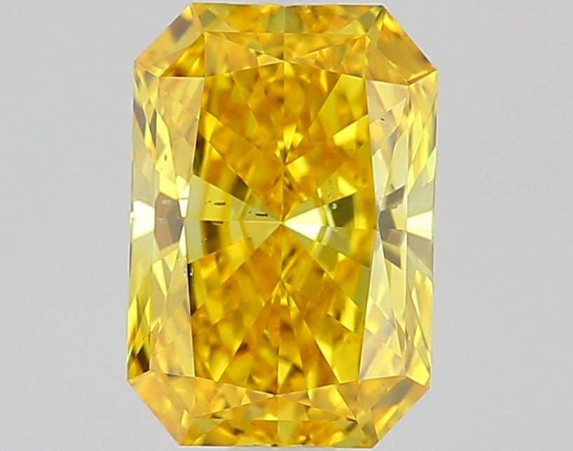 Loose Diamond - RADIANT 1.03ct Fancy Vivid Yellow SI1: Loose Diamond - RADIANT 1.03ct Fancy Vivid Yellow SI1 Source: This is a real non-mined Diamond that has been grown in a lab Shape: RADIANT Carats: 1.03 Color: Fancy Vivid Yellow Certification: IGI Vid