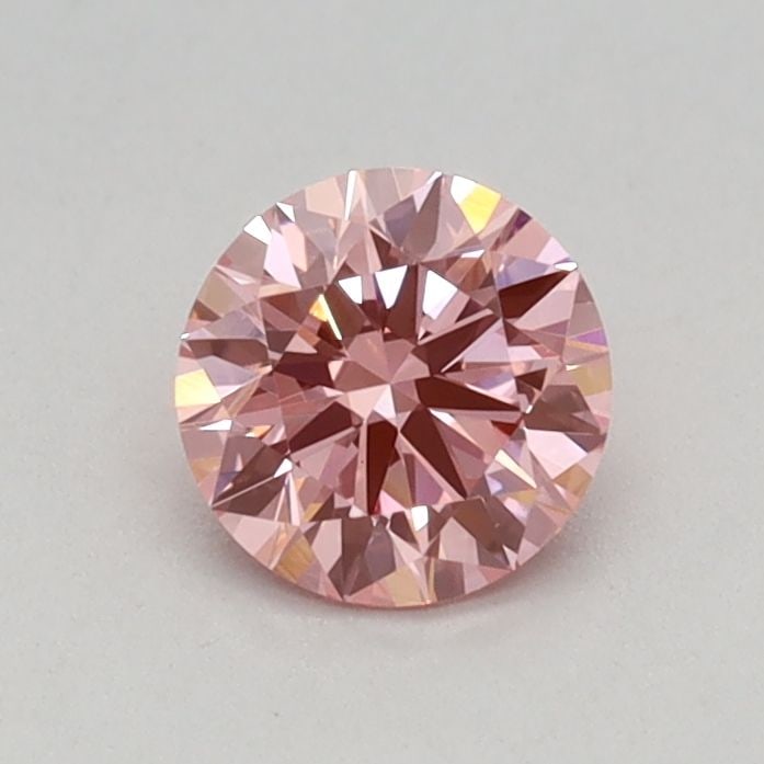 Loose Diamond - ROUND 0.4ct Fancy Vivid Pink VVS2: Loose Diamond - ROUND 0.4ct Fancy Vivid Pink VVS2 Source: This is a real non-mined Diamond that has been grown in a lab Shape: ROUND Carats: 0.4 Color: Fancy Vivid Pink Certification: IGI Video:
