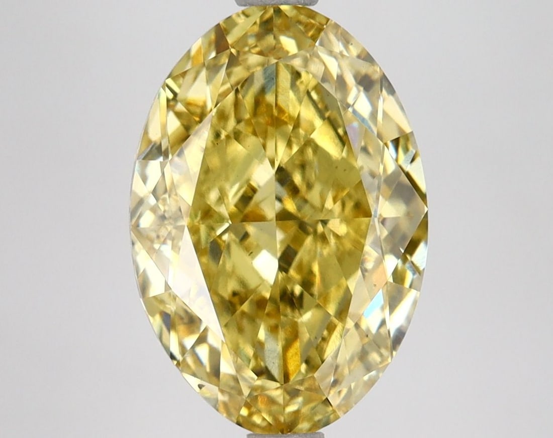Loose Diamond - OVAL 4.24ct Fancy Vivid Yellow VS1: Loose Diamond - OVAL 4.24ct Fancy Vivid Yellow VS1 Source: This is a real non-mined Diamond that has been grown in a lab Shape: OVAL Carats: 4.24 Color: Fancy Vivid Yellow Certification: IGI Video: