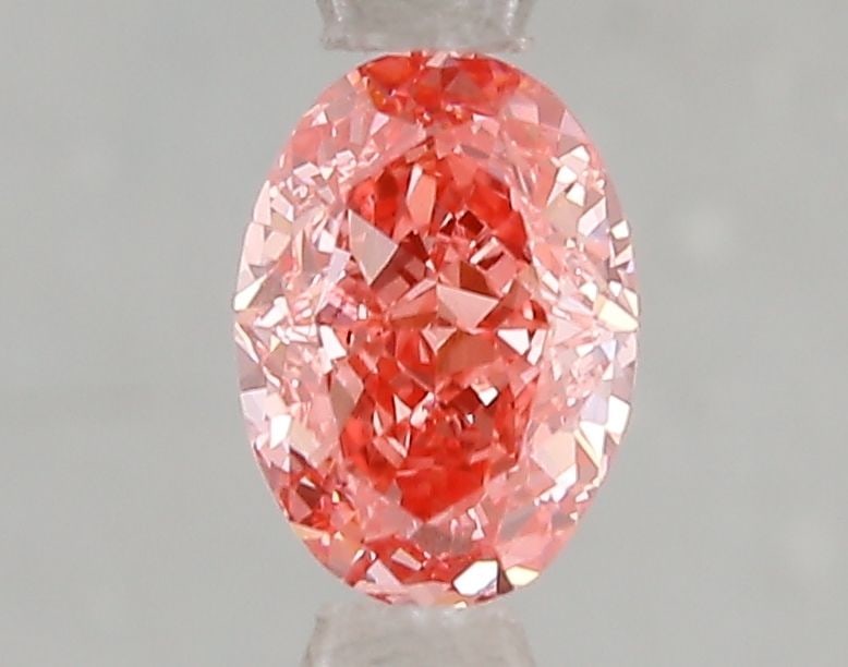 Loose Diamond - OVAL 1.01ct Fancy Vivid Pink VS1: Loose Diamond - OVAL 1.01ct Fancy Vivid Pink VS1 Source: This is a real non-mined Diamond that has been grown in a lab Shape: OVAL Carats: 1.01 Color: Fancy Vivid Pink Certification: IGI Video: