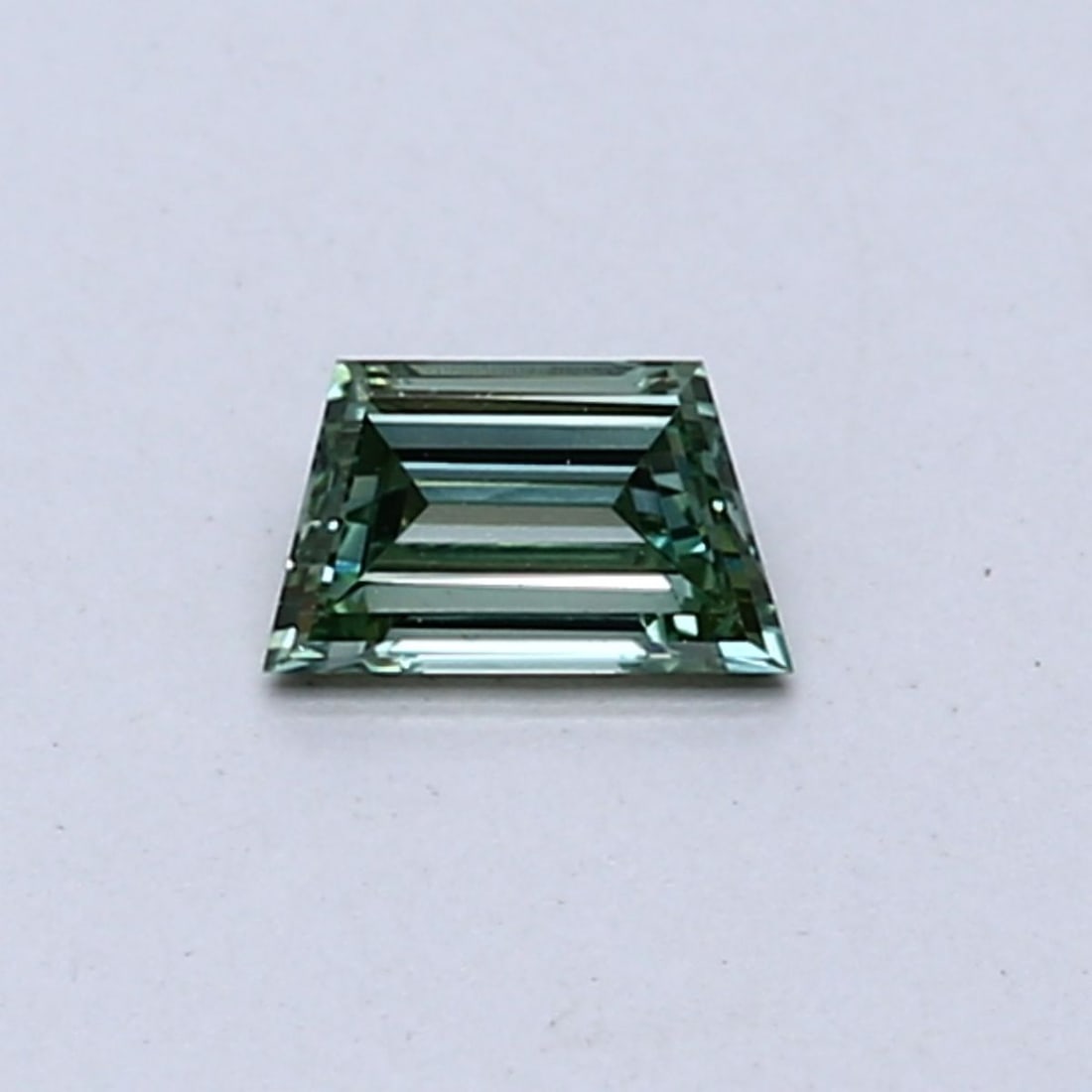 Loose Diamond - TRAPEZOID 0.25ct Fancy Vivid Green VS1: Loose Diamond - TRAPEZOID 0.25ct Fancy Vivid Green VS1 Source: This is a real non-mined Diamond that has been grown in a lab Shape: TRAPEZOID Carats: 0.25 Color: Fancy Vivid Green Certification: NONE