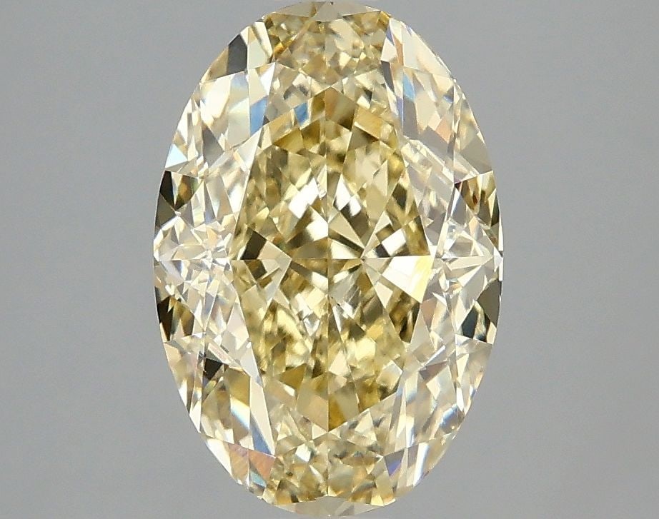 Loose Diamond - OVAL 3.05ct Fancy Intense Yellow VS1: Loose Diamond - OVAL 3.05ct Fancy Intense Yellow VS1 Source: This is a real non-mined Diamond that has been grown in a lab Shape: OVAL Carats: 3.05 Color: Fancy Intense Yellow Certification: IGI Video