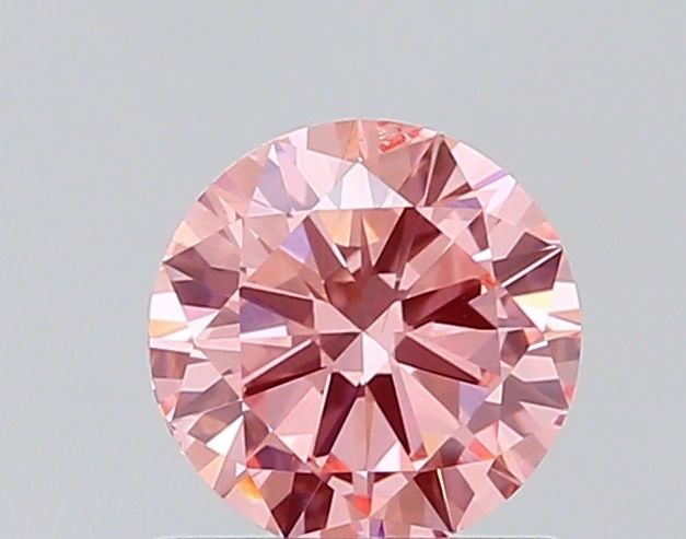 Loose Diamond - ROUND 0.7ct Fancy Vivid Pink SI1: Loose Diamond - ROUND 0.7ct Fancy Vivid Pink SI1 Source: This is a real non-mined Diamond that has been grown in a lab Shape: ROUND Carats: 0.7 Color: Fancy Vivid Pink Certification: NONE The Diamond