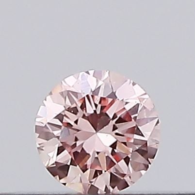 Loose Diamond - ROUND 0.1ct Fancy Intense Pink VS1: Loose Diamond - ROUND 0.1ct Fancy Intense Pink VS1 Source: This is a real non-mined Diamond that has been grown in a lab Shape: ROUND Carats: 0.1 Color: Fancy Intense Pink Certification: IGI Video: