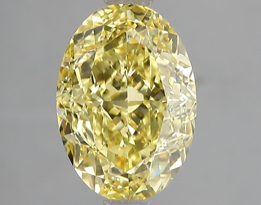 Loose Diamond - OVAL 3.02ct Fancy Vivid Yellow VS2: Loose Diamond - OVAL 3.02ct Fancy Vivid Yellow VS2 Source: This is a real non-mined Diamond that has been grown in a lab Shape: OVAL Carats: 3.02 Color: Fancy Vivid Yellow Certification: IGI Video: