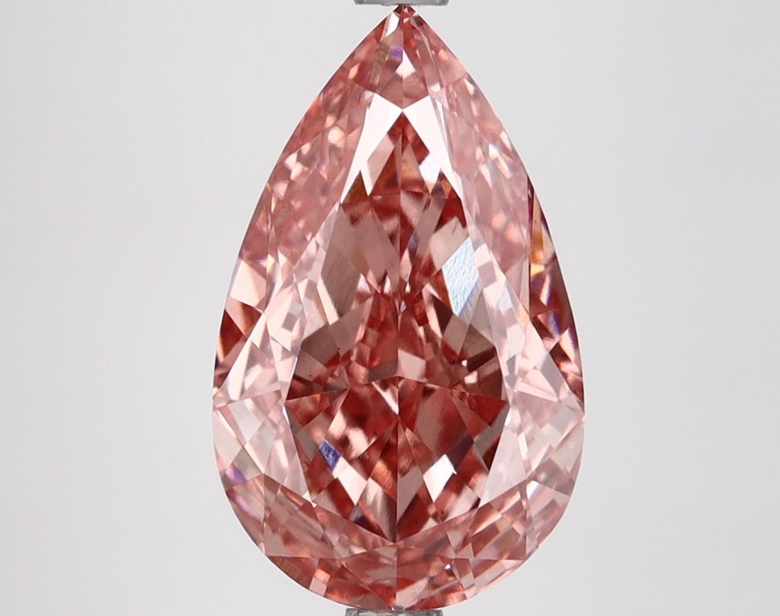 Loose Diamond - PEAR 3.54ct Fancy Vivid Brownish Pink VS1: Loose Diamond - PEAR 3.54ct Fancy Vivid Brownish Pink VS1 Source: This is a real non-mined Diamond that has been grown in a lab Shape: PEAR Carats: 3.54 Color: Fancy Vivid Brownish Pink Certification: