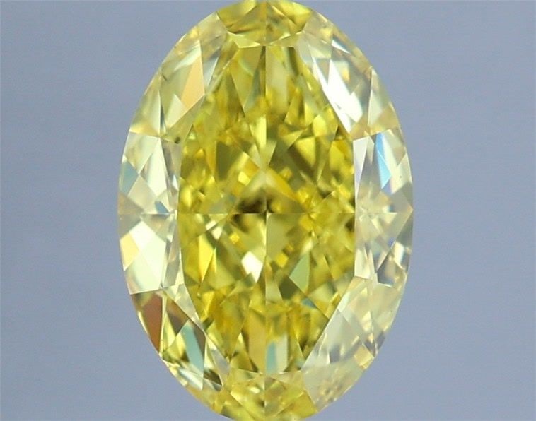 Loose Diamond - OVAL 1.43ct Fancy Vivid Yellow VVS2: Loose Diamond - OVAL 1.43ct Fancy Vivid Yellow VVS2 Source: This is a real non-mined Diamond that has been grown in a lab Shape: OVAL Carats: 1.43 Color: Fancy Vivid Yellow Certification: IGI Video: