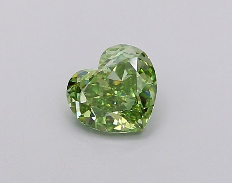 Loose Diamond - HEART 0.6ct Fancy Vivid Green VS1: Loose Diamond - HEART 0.6ct Fancy Vivid Green VS1 Source: This is a real non-mined Diamond that has been grown in a lab Shape: HEART Carats: 0.6 Color: Fancy Vivid Green Certification: IGI Video:
