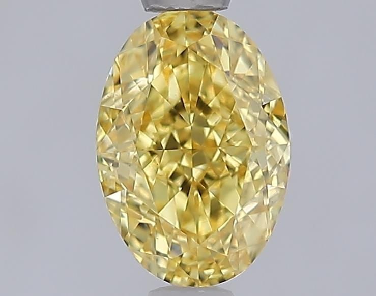 Loose Diamond - OVAL 1.07ct Fancy Vivid Yellow VVS2: Loose Diamond - OVAL 1.07ct Fancy Vivid Yellow VVS2 Source: This is a real non-mined Diamond that has been grown in a lab Shape: OVAL Carats: 1.07 Color: Fancy Vivid Yellow Certification: IGI Video: