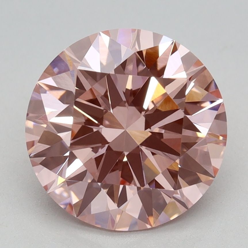 Ideal Loose Diamond - ROUND 2.1ct Fancy Vivid Pink VVS2: Ideal Loose Diamond - ROUND 2.1ct Fancy Vivid Pink VVS2 Source: This is a real non-mined Diamond that has been grown in a lab Shape: ROUND Carats: 2.1 Color: Fancy Vivid Pink Certification: IGI Video: