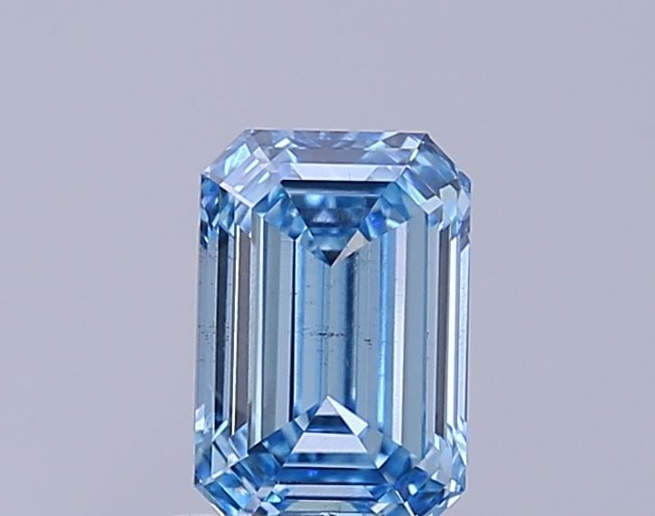 Loose Diamond - EMERALD 1.03ct Fancy Vivid Blue SI2: Loose Diamond - EMERALD 1.03ct Fancy Vivid Blue SI2 Source: This is a real non-mined Diamond that has been grown in a lab Shape: EMERALD Carats: 1.03 Color: Fancy Vivid Blue Certification: NONE Video: