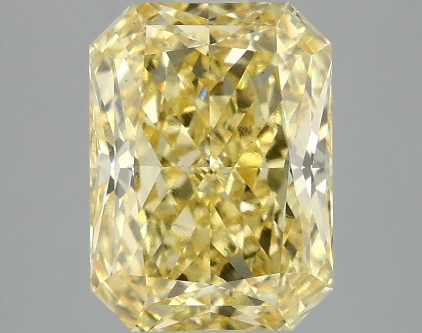 Loose Diamond - RADIANT 3.08ct Fancy Vivid Yellow VS1: Loose Diamond - RADIANT 3.08ct Fancy Vivid Yellow VS1 Source: This is a real non-mined Diamond that has been grown in a lab Shape: RADIANT Carats: 3.08 Color: Fancy Vivid Yellow Certification: IGI Vid