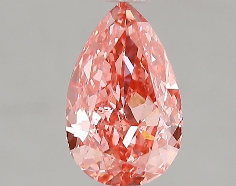 Loose Diamond - PEAR 1.01ct Fancy Vivid Pink VS2: Loose Diamond - PEAR 1.01ct Fancy Vivid Pink VS2 Source: This is a real non-mined Diamond that has been grown in a lab Shape: PEAR Carats: 1.01 Color: Fancy Vivid Pink Certification: IGI Video: