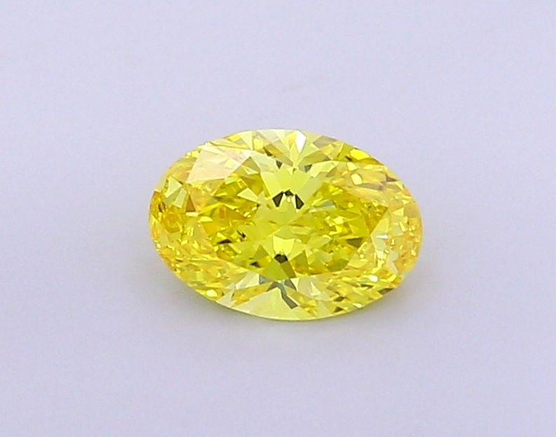 Loose Diamond - OVAL 1.04ct Fancy Vivid Yellow VVS2: Loose Diamond - OVAL 1.04ct Fancy Vivid Yellow VVS2 Source: This is a real non-mined Diamond that has been grown in a lab Shape: OVAL Carats: 1.04 Color: Fancy Vivid Yellow Certification: IGI Video:
