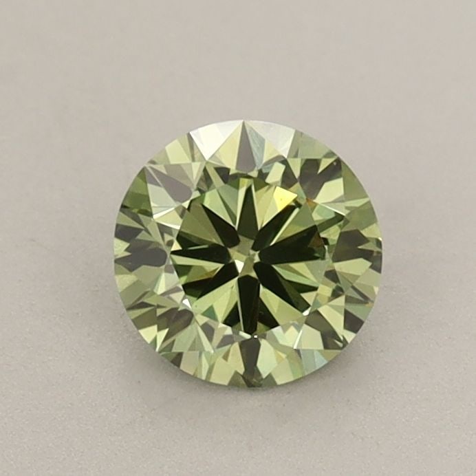 Loose Diamond - ROUND 0.6ct Fancy Vivid Green VS1: Loose Diamond - ROUND 0.6ct Fancy Vivid Green VS1 Source: This is a real non-mined Diamond that has been grown in a lab Shape: ROUND Carats: 0.6 Color: Fancy Vivid Green Certification: IGI Video: