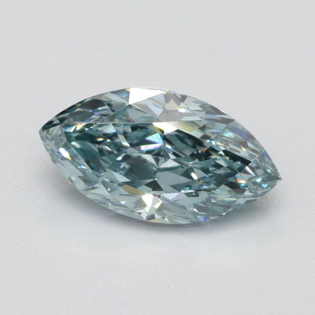 Loose Diamond - MARQUISE 1.22ct Fancy Vivid Greenish Blue VS2: Loose Diamond - MARQUISE 1.22ct Fancy Vivid Greenish Blue VS2 Source: This is a real non-mined Diamond that has been grown in a lab Shape: MARQUISE Carats: 1.22 Color: Fancy Vivid Greenish Blue Certif