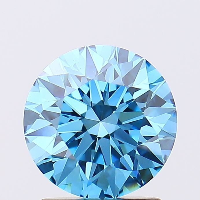 Loose Diamond - ROUND 1.7ct Fancy Vivid Blue VS1: Loose Diamond - ROUND 1.7ct Fancy Vivid Blue VS1 Source: This is a real non-mined Diamond that has been grown in a lab Shape: ROUND Carats: 1.7 Color: Fancy Vivid Blue Certification: IGI Video: