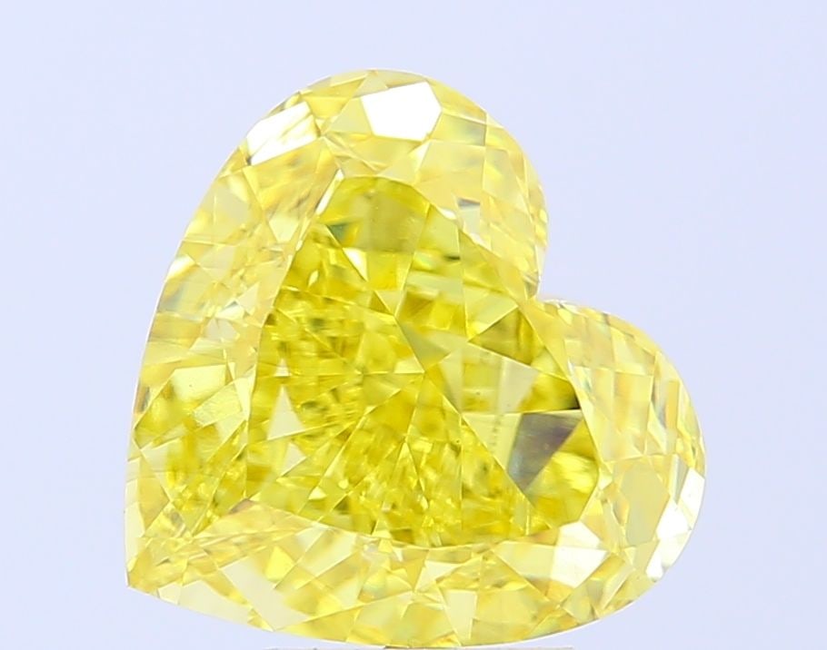 Loose Diamond - HEART 7.03ct Fancy Vivid Yellow VS2: Loose Diamond - HEART 7.03ct Fancy Vivid Yellow VS2 Source: This is a real non-mined Diamond that has been grown in a lab Shape: HEART Carats: 7.03 Color: Fancy Vivid Yellow Certification: IGI Video: