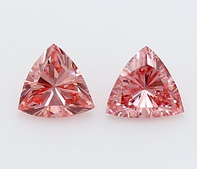 Loose Diamond - TRIANGULAR 0.53ct Pink VVS2: Loose Diamond - TRIANGULAR 0.53ct Pink VVS2 Source: This is a real non-mined Diamond that has been grown in a lab Shape: TRIANGULAR Carats: 0.53 Color: Pink Certification: NONE Video: