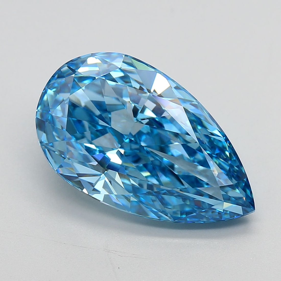 Loose Diamond - PEAR 7.38ct Fancy Vivid Blue VVS2: Loose Diamond - PEAR 7.38ct Fancy Vivid Blue VVS2 Source: This is a real non-mined Diamond that has been grown in a lab Shape: PEAR Carats: 7.38 Color: Fancy Vivid Blue Certification: IGI Video: