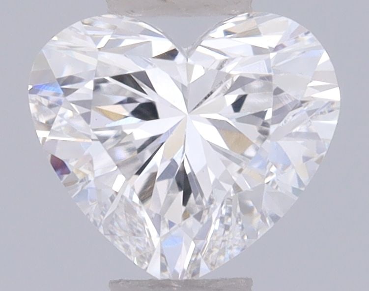 Loose Diamond - HEART 0.39ct D VVS2: Loose Diamond - HEART 0.39ct D VVS2 Source: This is a real non-mined Diamond that has been grown in a lab Shape: HEART Carats: 0.39 Color: D Clarity: VVS2 Certification: IGI Video: