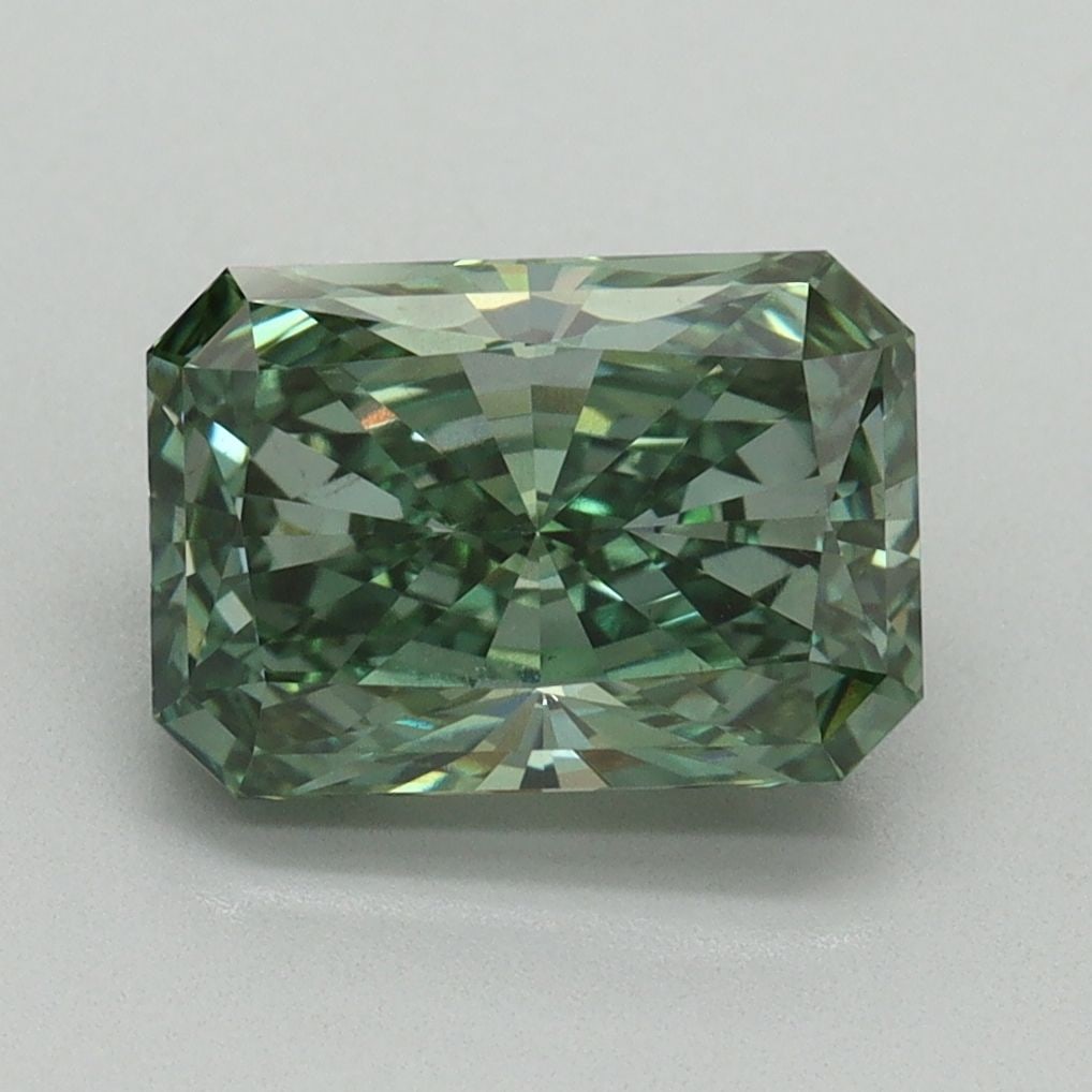 Loose Diamond - RADIANT 2.6ct Fancy Vivid Green VS1: Loose Diamond - RADIANT 2.6ct Fancy Vivid Green VS1 Source: This is a real non-mined Diamond that has been grown in a lab Shape: RADIANT Carats: 2.6 Color: Fancy Vivid Green Certification: IGI Video: