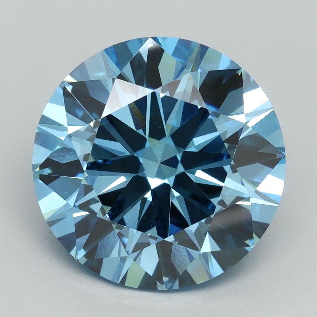 Loose Diamond - ROUND 7.08ct Fancy Vivid Blue VVS2: Loose Diamond - ROUND 7.08ct Fancy Vivid Blue VVS2 Source: This is a real non-mined Diamond that has been grown in a lab Shape: ROUND Carats: 7.08 Color: Fancy Vivid Blue Certification: IGI Video: