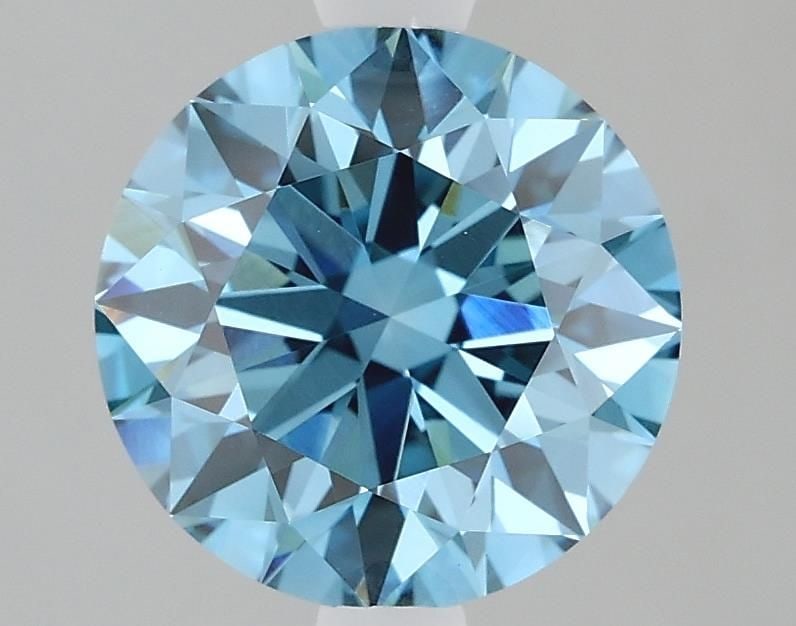 Ideal Loose Diamond - ROUND 2.21ct Fancy Vivid Blue VVS2: Ideal Loose Diamond - ROUND 2.21ct Fancy Vivid Blue VVS2 Source: This is a real non-mined Diamond that has been grown in a lab Shape: ROUND Carats: 2.21 Color: Fancy Vivid Blue Certification: IGI Vide