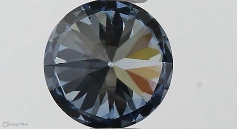 Loose Diamond - ROUND 0.5ct Fancy Vivid Blue VS1: Loose Diamond - ROUND 0.5ct Fancy Vivid Blue VS1 Source: This is a real non-mined Diamond that has been grown in a lab Shape: ROUND Carats: 0.5 Color: Fancy Vivid Blue Certification: IGI Video: