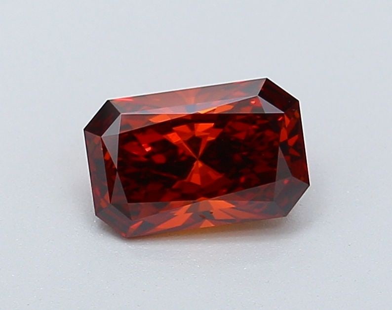 Loose Diamond - RADIANT 0.92ct Fancy Deep Orange VS1: Loose Diamond - RADIANT 0.92ct Fancy Deep Orange VS1 Source: This is a real non-mined Diamond that has been grown in a lab Shape: RADIANT Carats: 0.92 Color: Fancy Deep Orange Certification: IGI Video