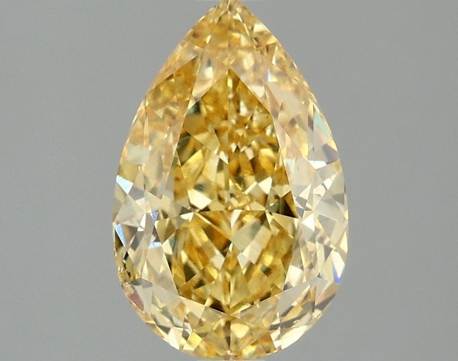 Loose Diamond - PEAR 2.02ct Fancy Vivid Yellow VS2: Loose Diamond - PEAR 2.02ct Fancy Vivid Yellow VS2 Source: This is a real non-mined Diamond that has been grown in a lab Shape: PEAR Carats: 2.02 Color: Fancy Vivid Yellow Certification: IGI Video: