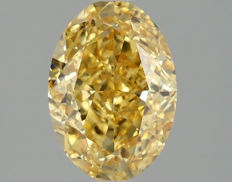 Loose Diamond - OVAL 1.58ct Fancy Vivid Yellow VVS2: Loose Diamond - OVAL 1.58ct Fancy Vivid Yellow VVS2 Source: This is a real non-mined Diamond that has been grown in a lab Shape: OVAL Carats: 1.58 Color: Fancy Vivid Yellow Certification: IGI Video:
