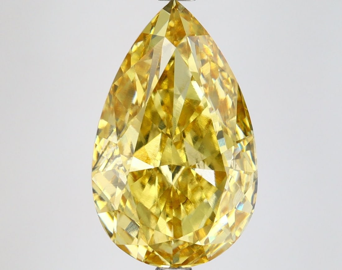 Loose Diamond - PEAR 6.02ct Fancy Vivid Yellow VS2: Loose Diamond - PEAR 6.02ct Fancy Vivid Yellow VS2 Source: This is a real non-mined Diamond that has been grown in a lab Shape: PEAR Carats: 6.02 Color: Fancy Vivid Yellow Certification: IGI Video: