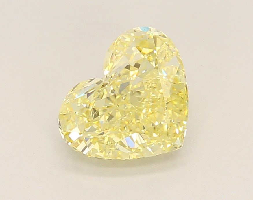 Loose Diamond - HEART 1.62ct Fancy Intense Yellow VS1: Loose Diamond - HEART 1.62ct Fancy Intense Yellow VS1 Source: This is a real non-mined Diamond that has been grown in a lab Shape: HEART Carats: 1.62 Color: Fancy Intense Yellow Certification: IGI Vid